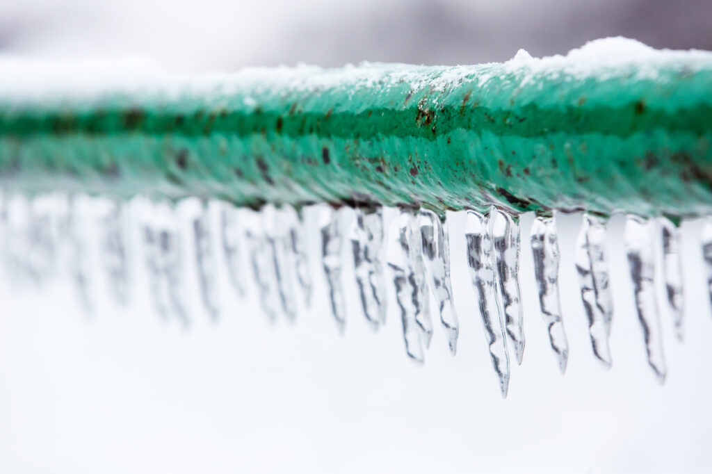 Frozen icy plumbing pipe